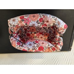 Trousse de toilette en tissu moumoute rose à fleurs avec poignée rose