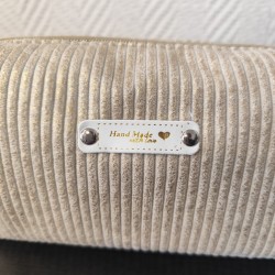 Trousse de toilette en velours doré et intérieur fleuri écru