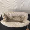 Trousse de toilette en velours doré et intérieur fleuri écru