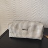 Trousse de toilette en velours argenté et intérieur étoilé argenté