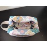 Trousse de toilette en tissu moumoute rose à fleurs avec poignée