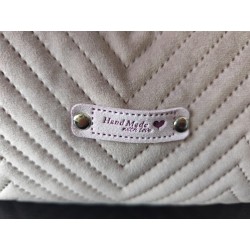 Trousse de toilette en velours matelassé rose parme tout doux  avec poignée