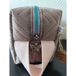 Trousse de toilette en velours matelassé rose parme tout doux  avec poignée